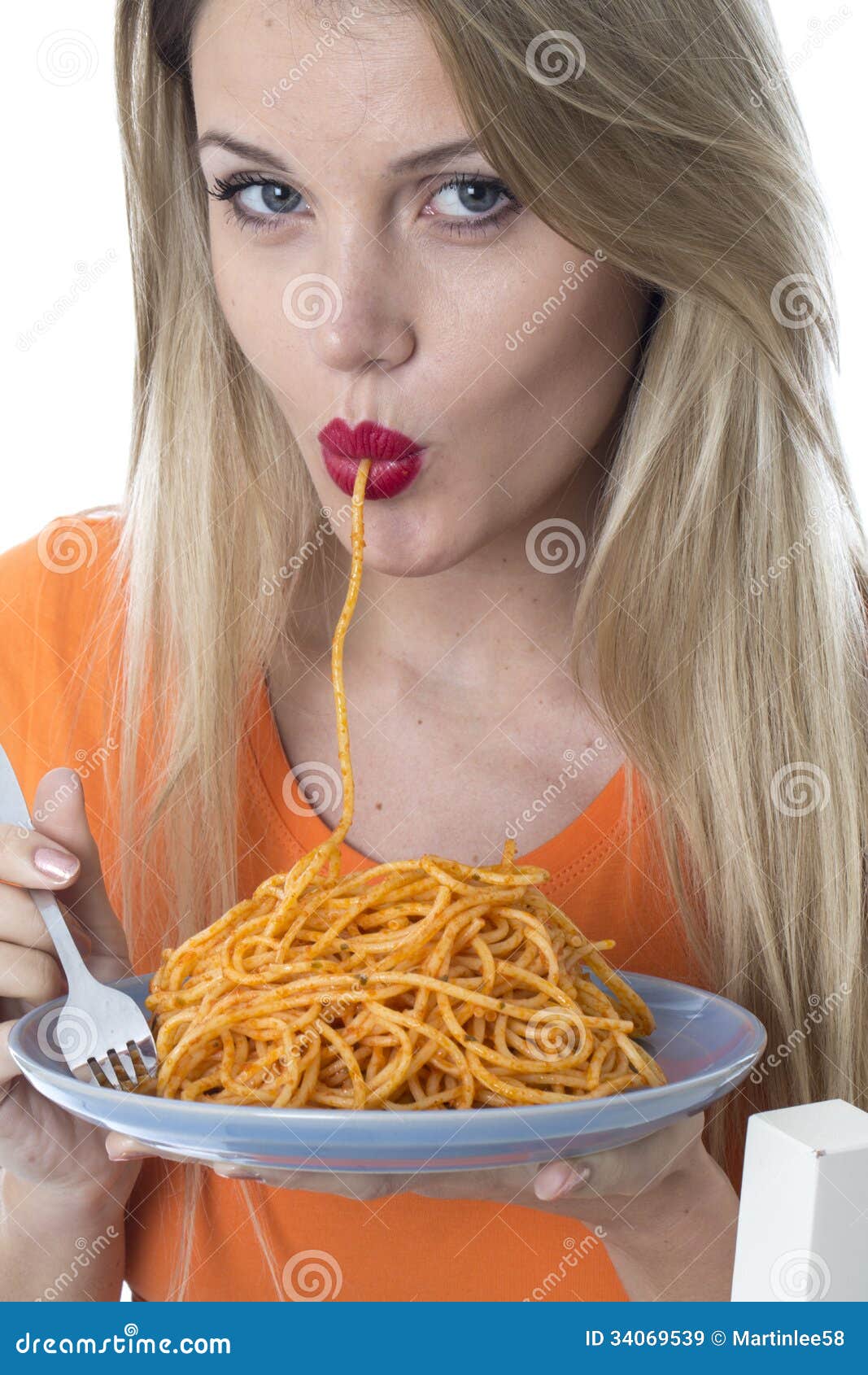 young-woman-eating-spaghetti-pasta-model-released-attractive-34069539.jpg